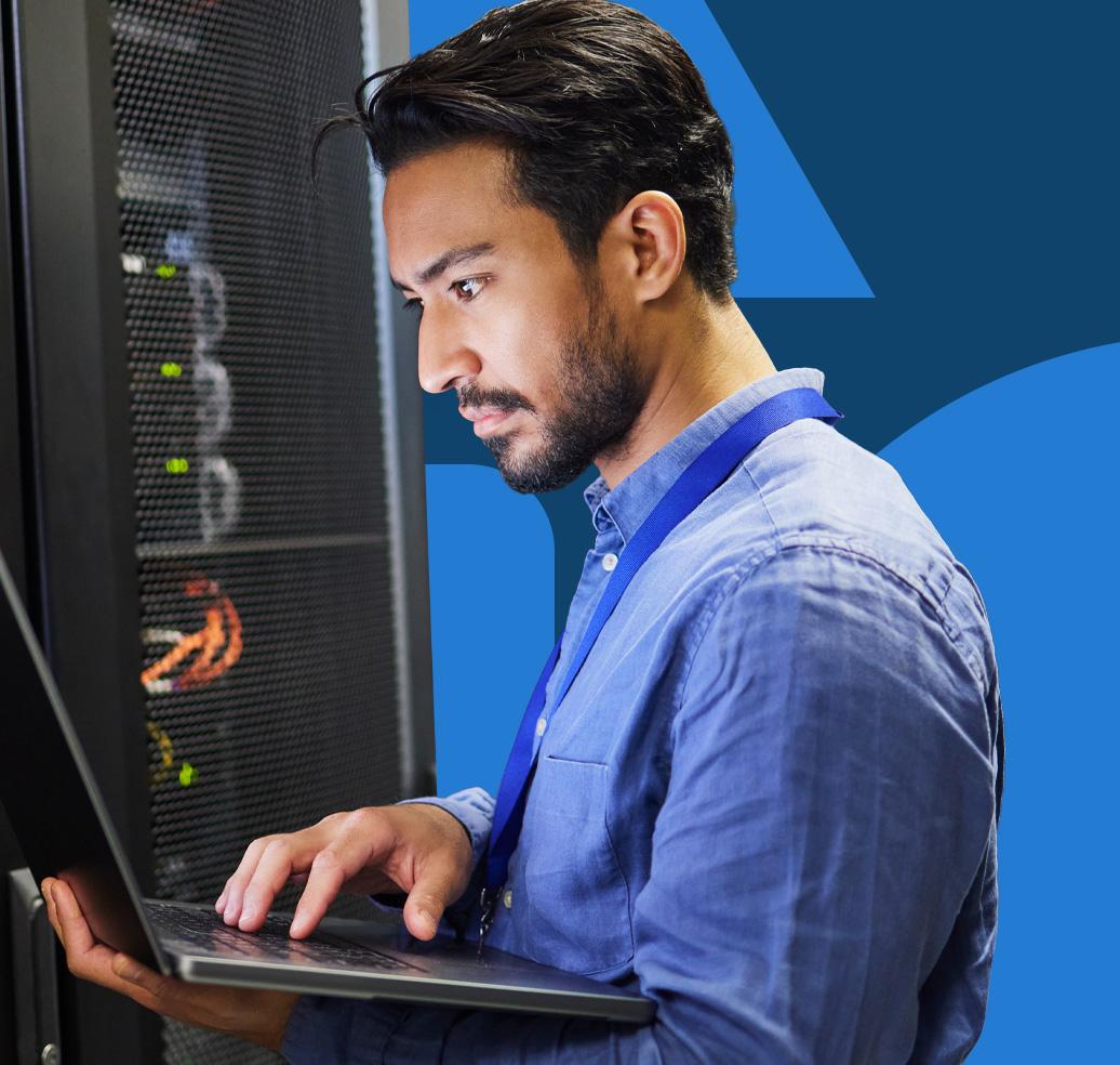 An engineer configuring infrastructure at a server rack