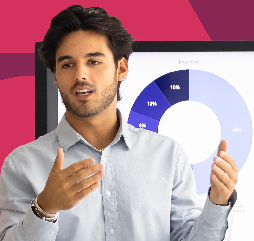 A presenter explaining data architecture with a chart behind them