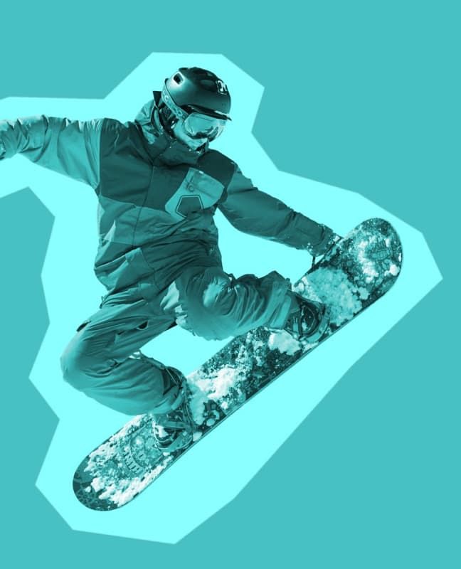 A person on a snowboard in the air.