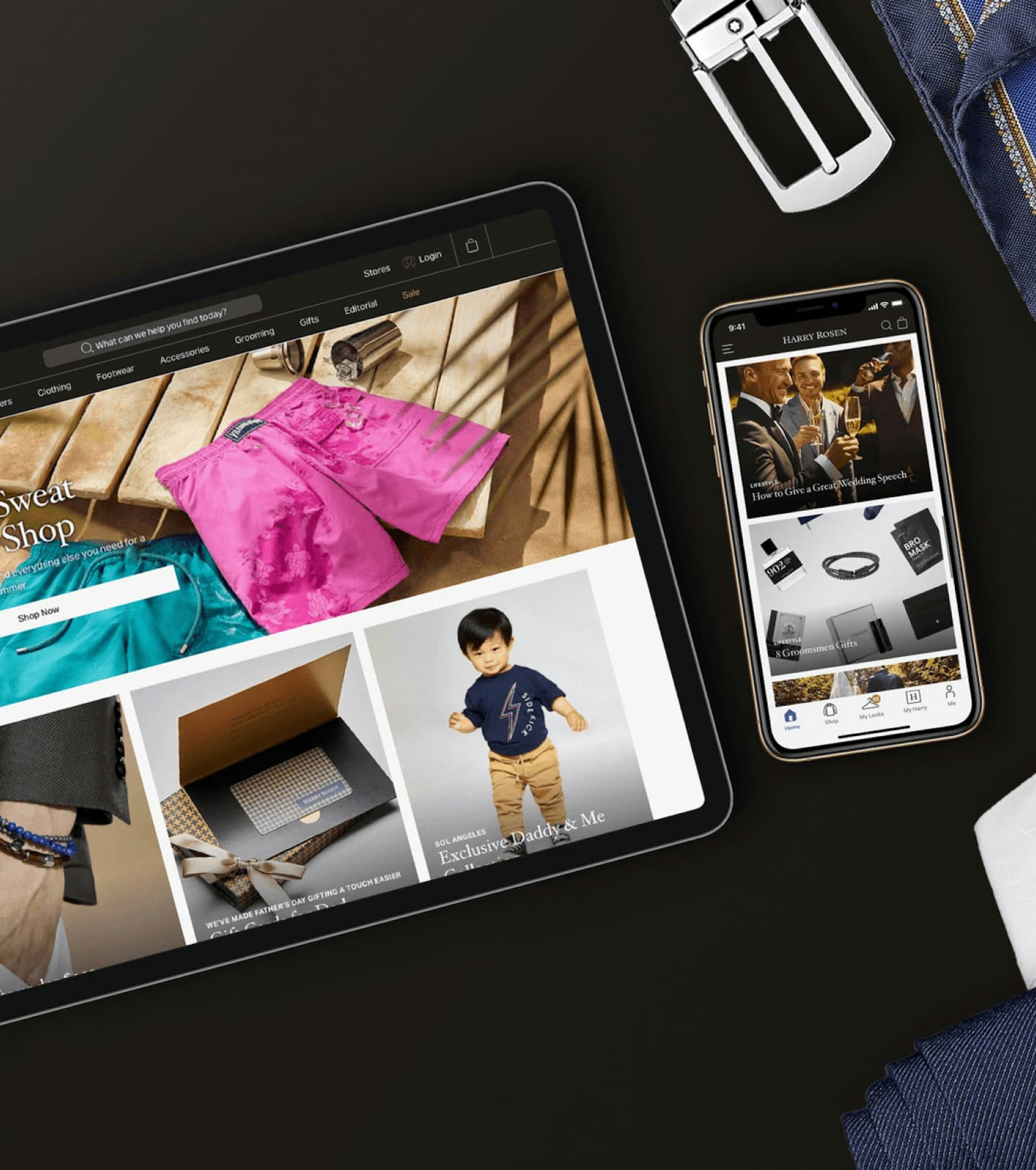 Flatlay of the Harry Rosen website on an iPad and iPhone with clothing and accessories around the devices.