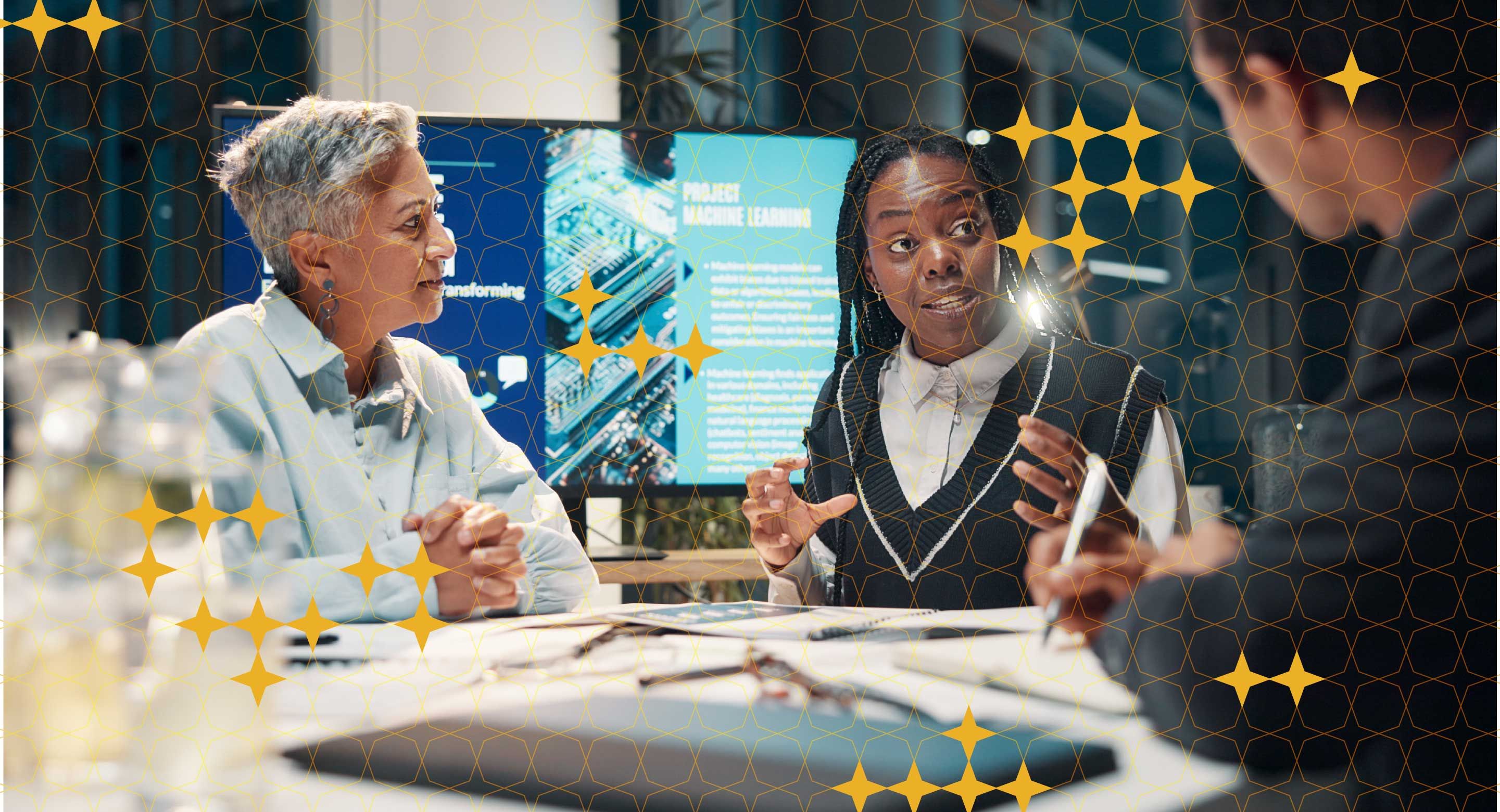 Three people have a discussion in a modern meeting room, with a large monitor in the background and a gold star pattern overlay.